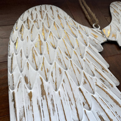 Farmhouse distressed metal angel wings wall sculpture, white and gold, jute loop, 34-inch wide
