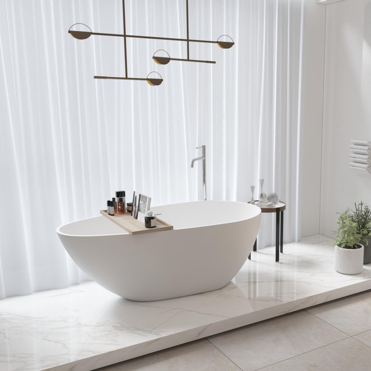 69.3"L x 33.5"W x 21.7"H Solid Surface Freestanding Oval Tub with Overflow and Drain