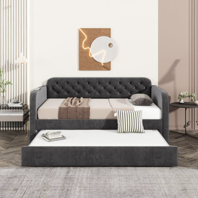 Lit simple en velours gris foncé avec lit gigogne et lit gigogne confortable