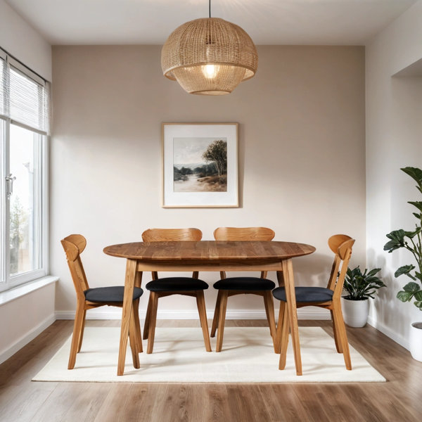 Corrigan Studio Phoibos Extendable Oval Solid Wood Dining Table ...