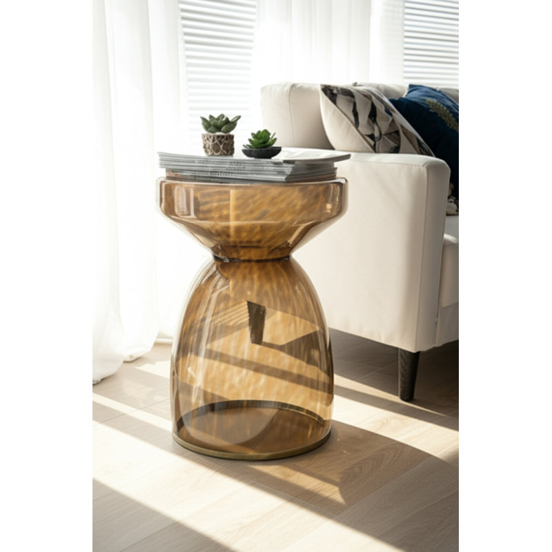 Glass and Metal Accent Table with Modern Sculptural Design.