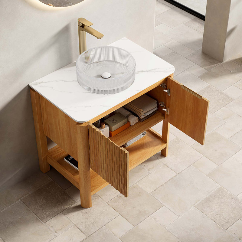 Meuble-lavabo autoportant avec plateau en pierre frittée et lavabo en verre