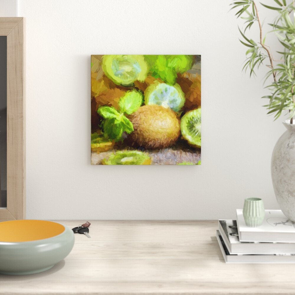 Leinwandbild Appetitliche Kiwis auf Holztisch