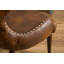 Fauteuil demi-tonneau capitonné à dossier capitonné