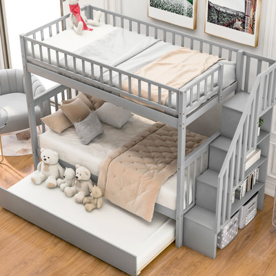 Lit simple superposé au dessus d'un lit gigogne gris, 4 tablettes de rangement, matelas de 6 po et 6 pi
