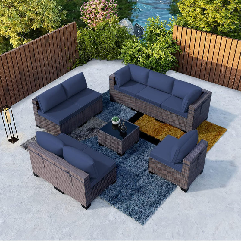 Yasmina 9-Piece Rattan Sectional Seating Group with Cushions And Tempered Glass Table, Navy