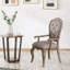 Fauteuil capitonné en tissu gris