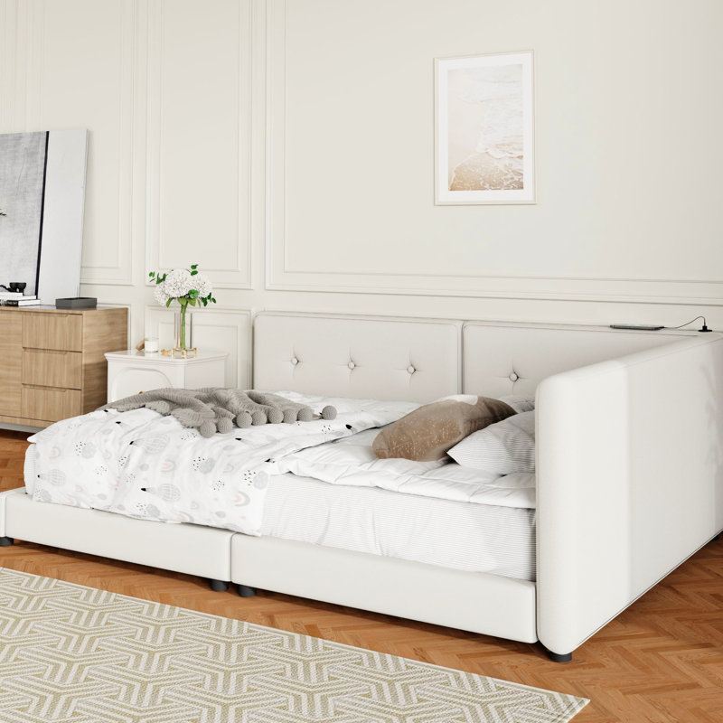 Grand lit tapissier beige avec charge - construction robuste et élégantes lattes en lin de style hublot