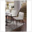 Chaises d'appoint en similicuir ivoire avec structure en métal noir, siège rembourré et design contemporain pour une salle à manger élégante