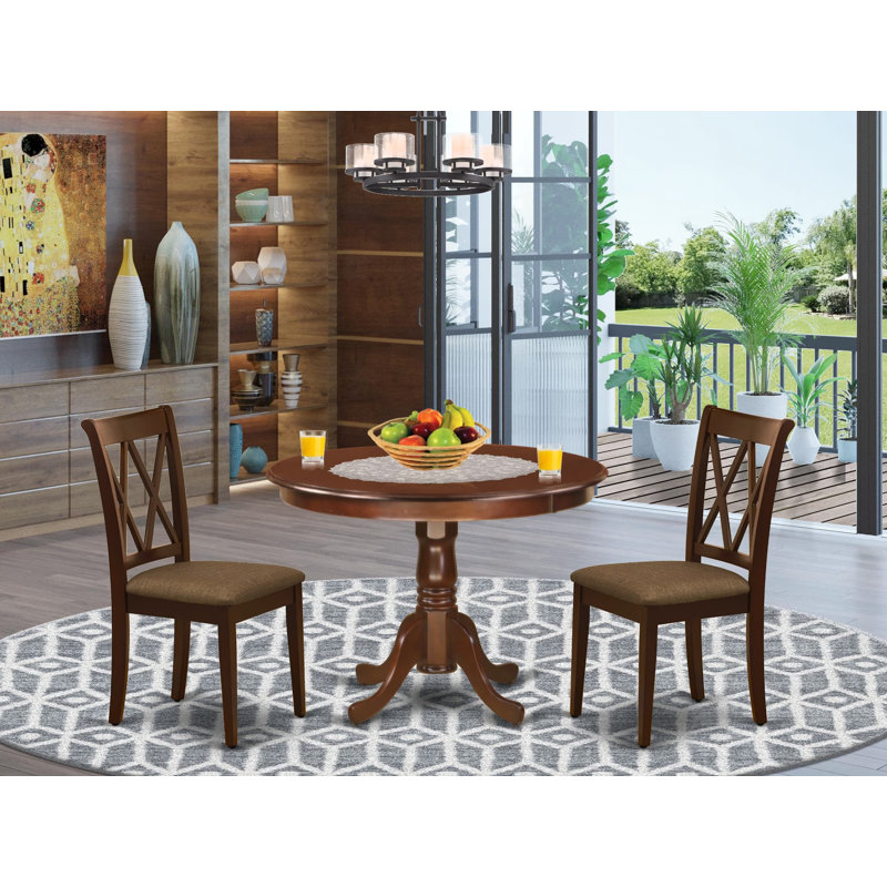 L'ensemble de mobilier de salle à manger 3 pièces comprend une table de cuisine ronde avec piédestal et 2 chaises de salle à manger rembourrées en tissu de lin, acajou