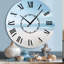 Minimalisme Beachside Serenity - horloge murale-1138816034