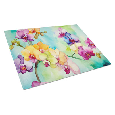 Orchidées dans une grande planche à découper en verre aquarelle