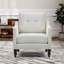 Fauteuil rembourré avec accoudoirs carrés et capitonnés-579925322