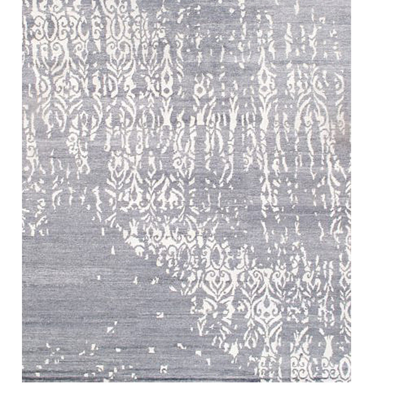 Tapis gris / blanc en laine noué à la main