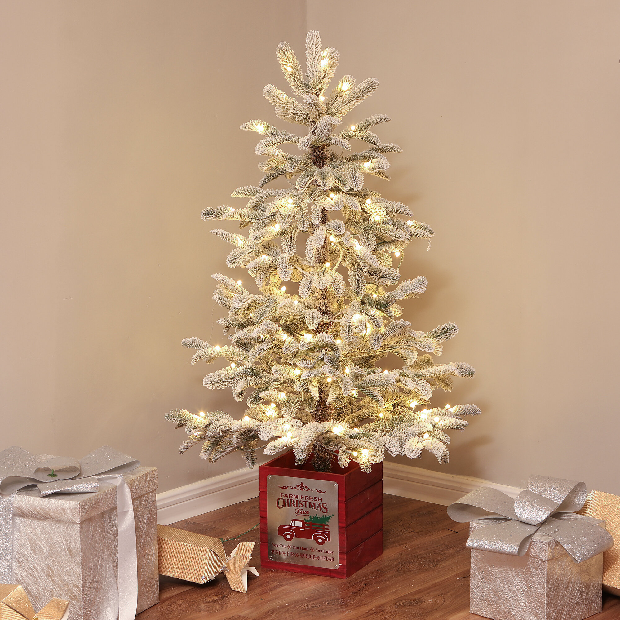 https://assets.wfcdn.com/im/37552977/compr-r85/9061/90619570/4-lighted-christmas-tree.jpg