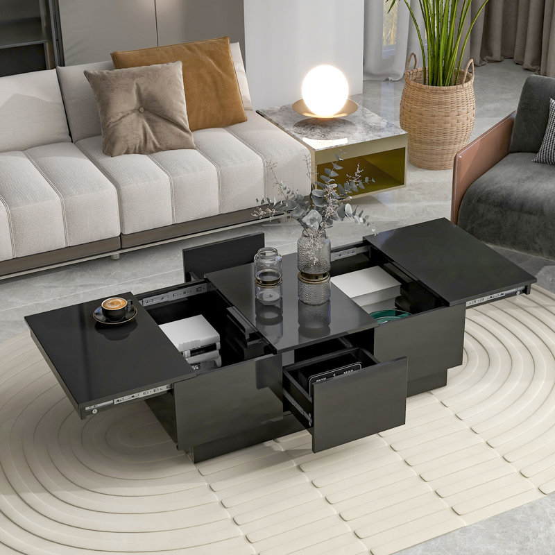 Table basse noire avec fonction extensible et 2 espaces de rangement cachés pour la chambre à coucher