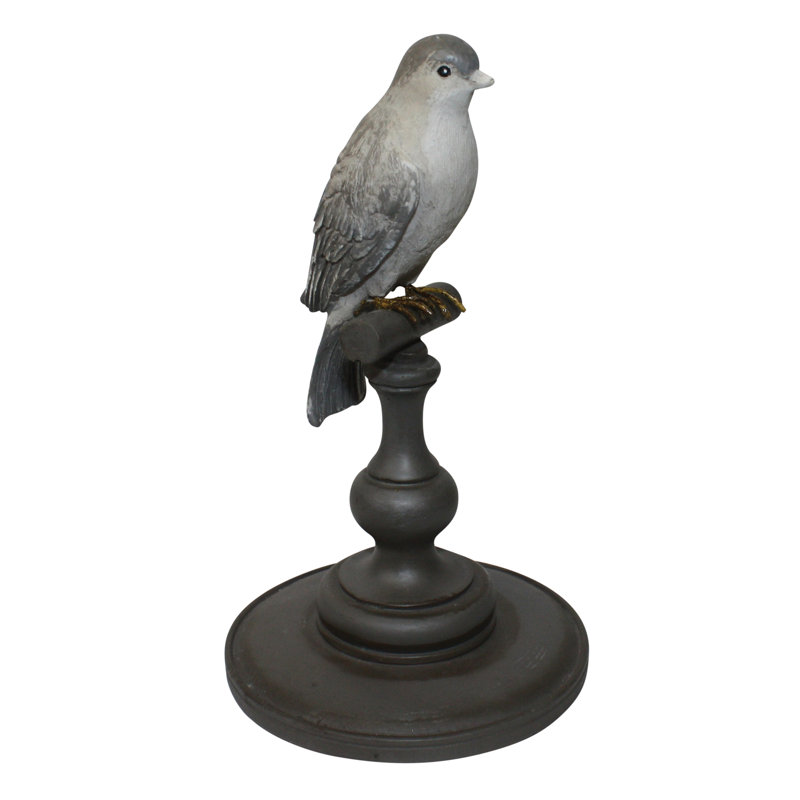 Figurine sur pied oiseau