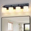 Applique murale de style ferme pour miroir, 70 cm (27,6 po), noire, à 4 lumières, avec abat-jour en verre dépoli et douilles E26.