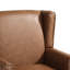 Fauteuil à oreilles en similicuir brun rembourré avec garniture cloutée Duward-374568035