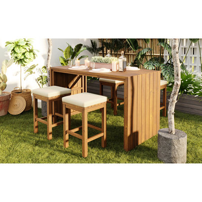 Bar en bois de patio 5 pièces avec quatre tabourets et coussins de siège confortables, idéal pour les réceptions au bord de la piscine, stable sur les fêtes inégales,
