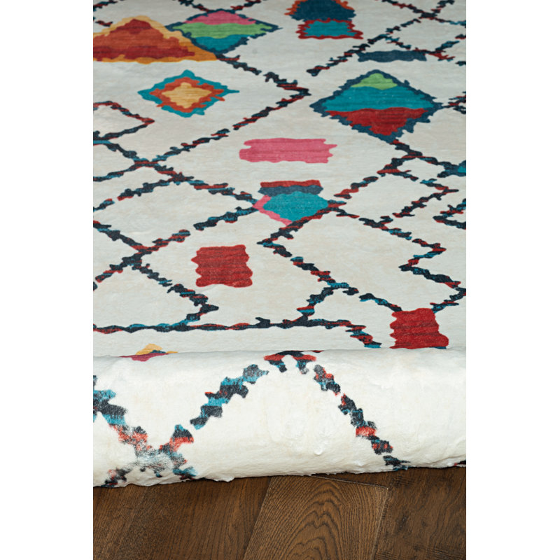 Antaniyah Faux Rabbit Fur Hand Tufted Rug, Rectangle 5' x 7'