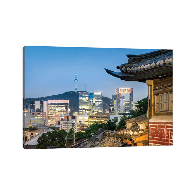 Historic Bukchon Hanok Village In Seoul With View Of The N Seoul Tower And Namsan Mountain by Jan Becke - Wrapped Canvas Print
