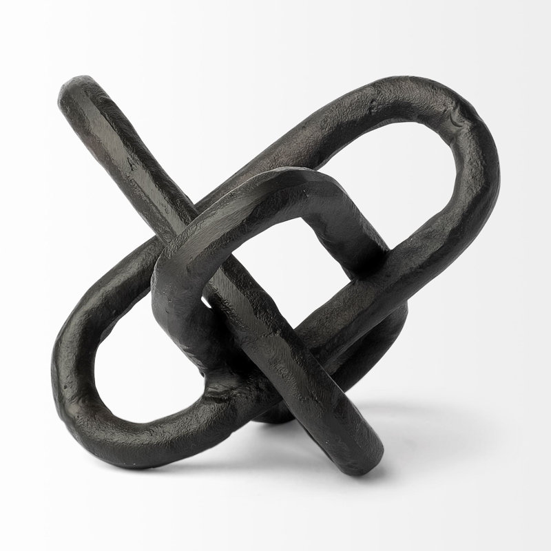 Petite sculpture en métal à mailles noires