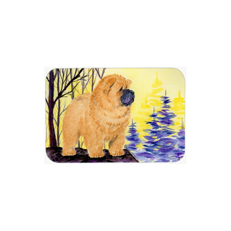 Chow-chow sur planche à découper en verre