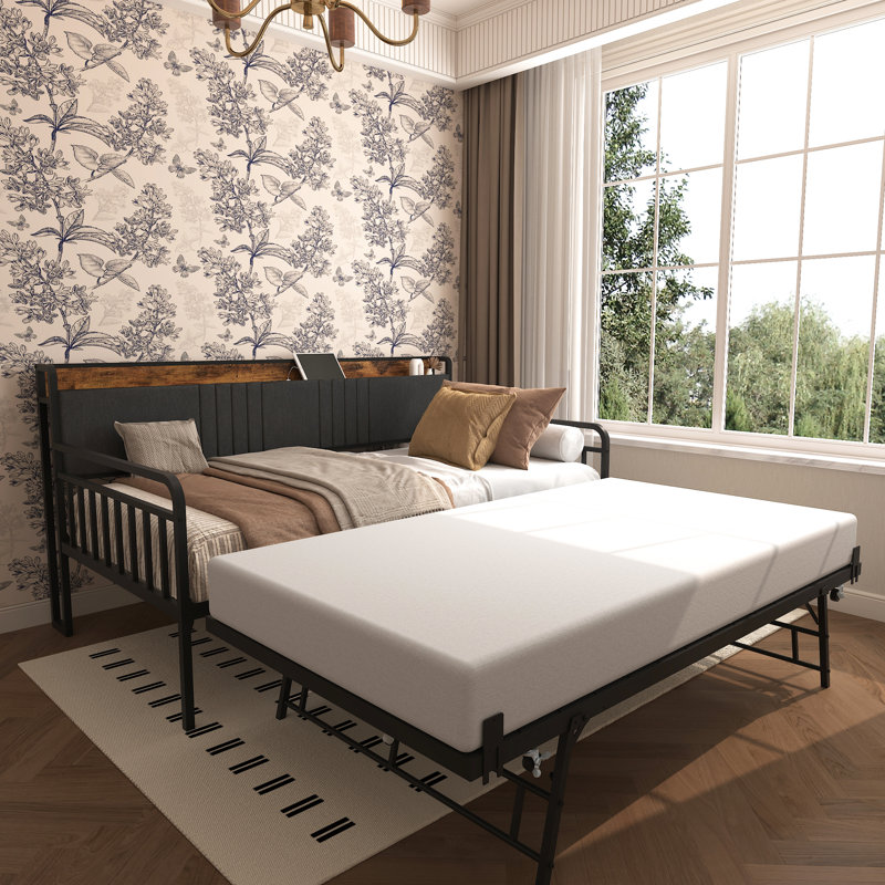 Lit de jour gigogne avec lit simple en métal noir, tête de lit rembourrée, prises de recharge, éclairage intégré pour le salon. Ce lit de jour gigogne comprend un cadre de lit, une tablette de tête de lit, un éclairage et des prises de recharge. Pratique pour la chambre.