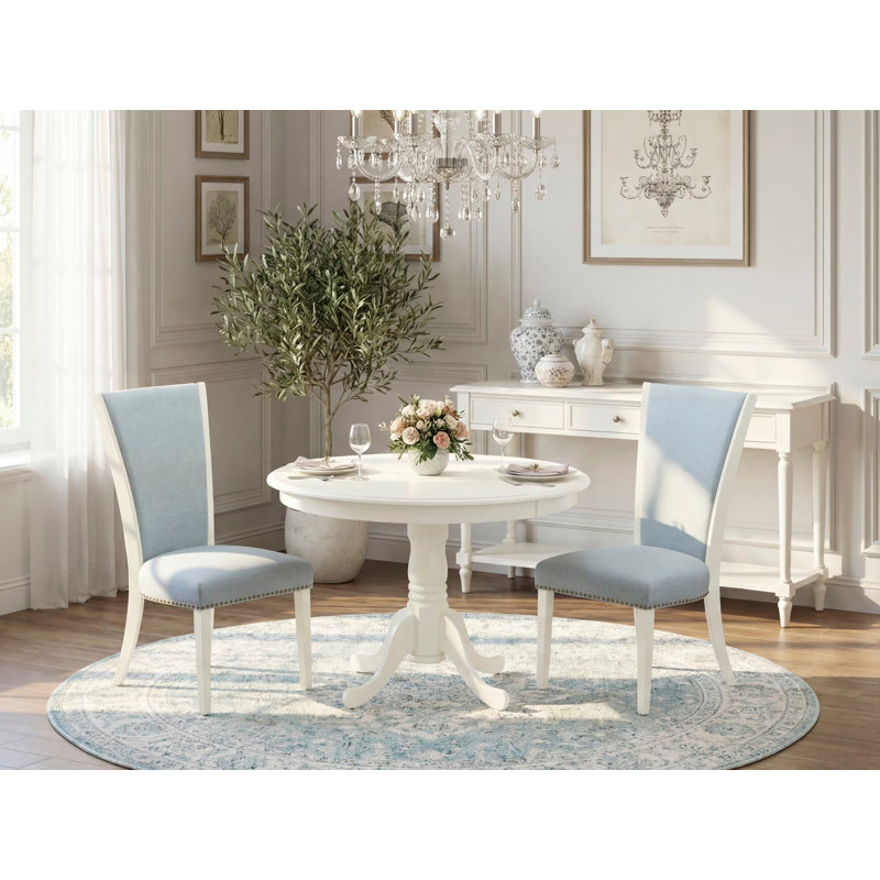 L'ensemble 3 pièces de table de cuisine et chaises comprend une table de salle à manger ronde avec piédestal et 2 chaises Parson en tissu bleu bébé, lin blanc
