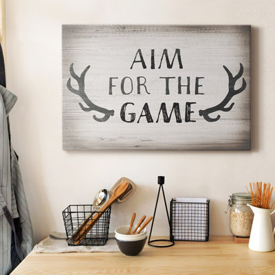 Toile tendue avec châssis de qualité supérieure Aim Game - prête à être accrochée