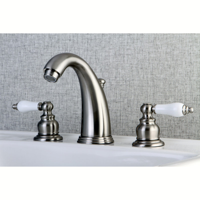 Kingston Brass Victorian Two-Handle 3-Hole Deck Mount Widespread Bathroom Faucet with Retail Pop-Up Drain