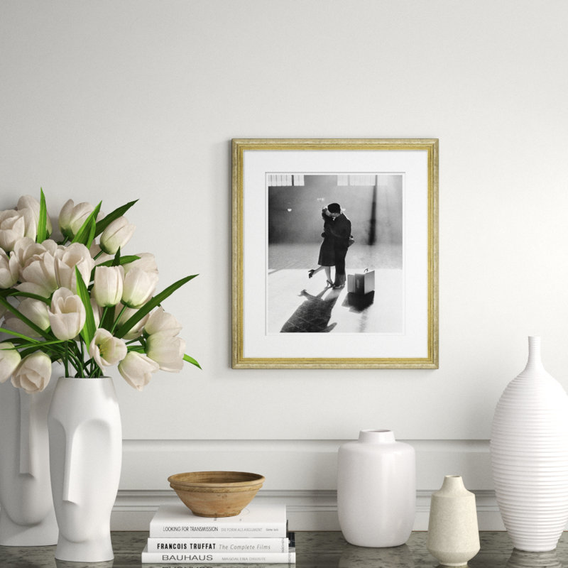 Couple Kissing in Train Station Framed