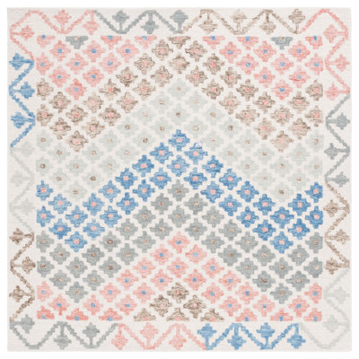 Aapri Hand Tufted Wool/Cotton/Latex Geometric Rug in Blue/Ivory