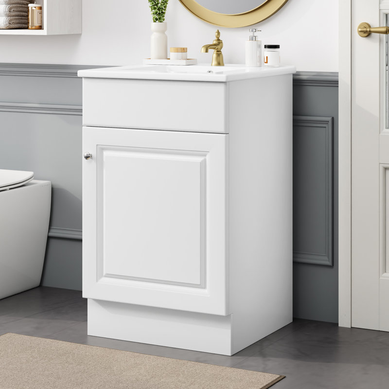 Meuble-lavabo de 50 cm avec lavabo en céramique blanche. Étagère de rangement. Vasque prépercé pour robinetterie et surface lisse. Porte de rangement pratique. Finition silencieuse.