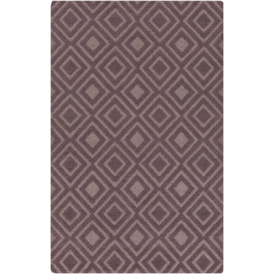 Tapis brun tissé à plat à motif géométrique