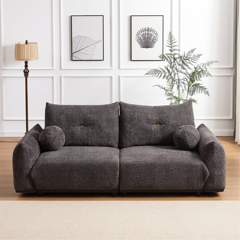 Coussin rembourré en mousse grise confortable avec 2 décorations en laine d'agneau