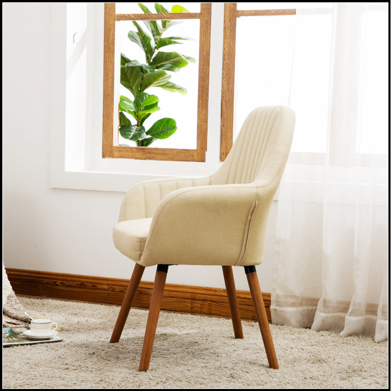 Chaise d'appoint contemporaine en tissu Tuchico au confort luxueux et au design unique pour les espaces de vie modernes