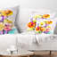 Coussin décoratif avec imprimé floral jaune et rose Gerbera
