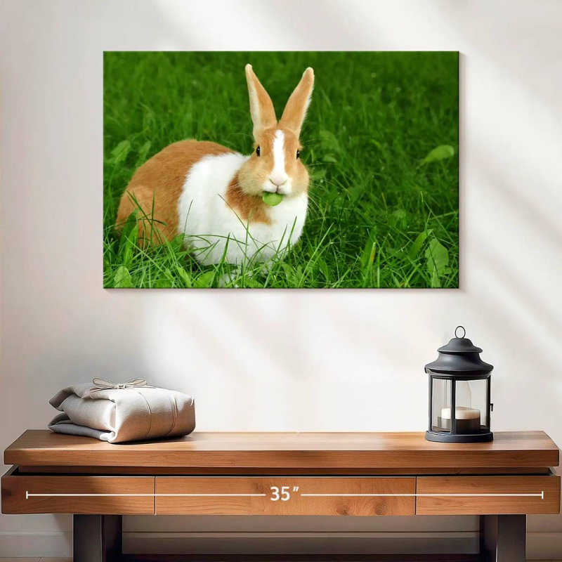 Lapin mangeant une feuille, H 16 po x l 24 po