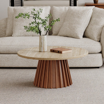 Image de couleur pierre et table basse ronde unie