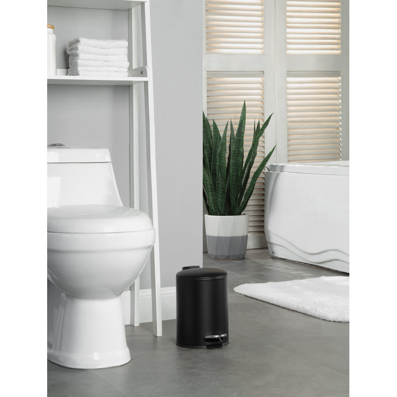 Compact Black Cylindrical Step-On Trash Can with Inner Bucket