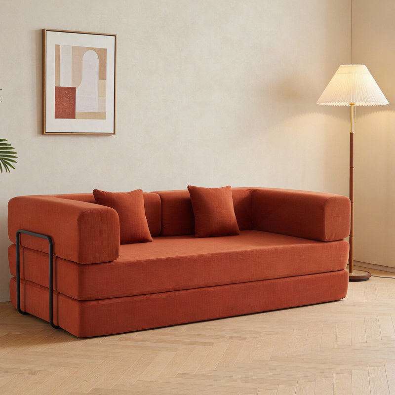 Canapé-lit convertible avec coussin cylindrique et cadre de forme fixe pour des espaces de vie multifonctionnels., Orange