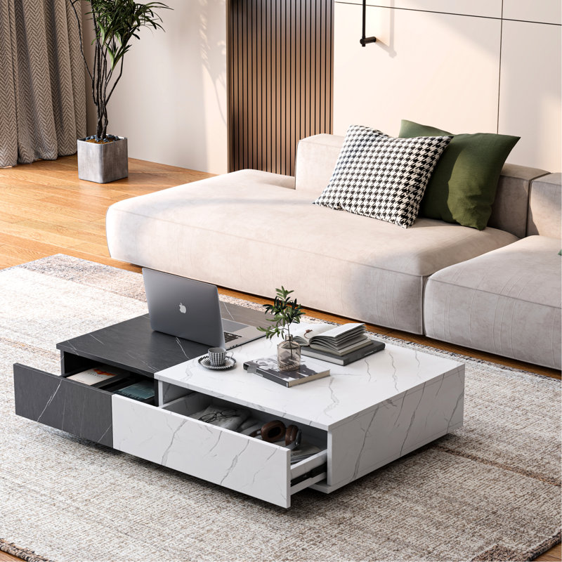Table basse rectangulaire noire et blanche avec fini marbre et tiroirs de rangement intégrés