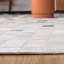 Tapis ivoire / noir en tissu feutré à la main Carlino-599137722