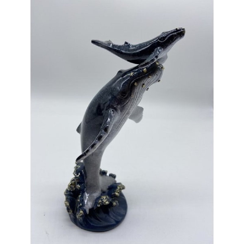 Baleine Lytchett et veau sur la vague