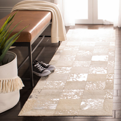 Bremner Hand-Woven Ivory Area Rug