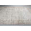 Grand tapis turc beige avec des motifs géométriques parfaits pour un décor de salon en laine robuste