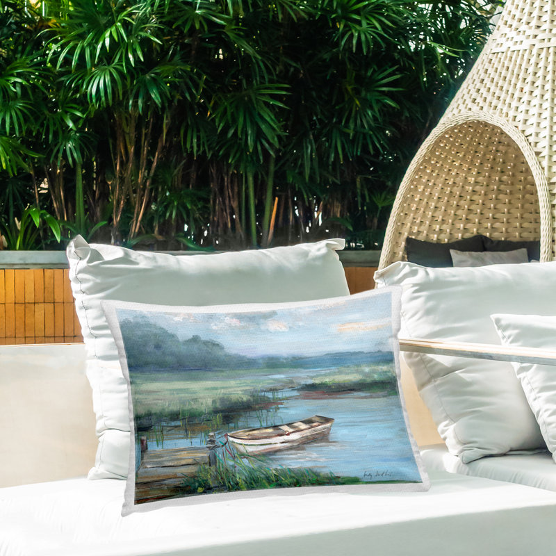 Docked Rowboat at Lake's Edge Outdoor Printed Pillow design by Sally Swatland