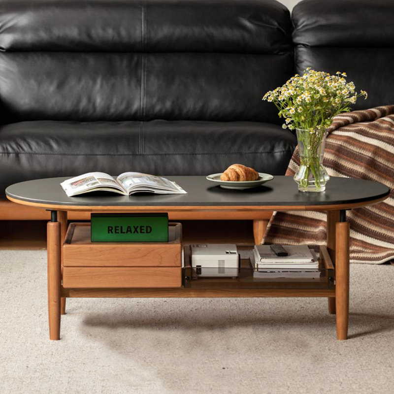 Table basse en pierre frittée avec tablette ouverte